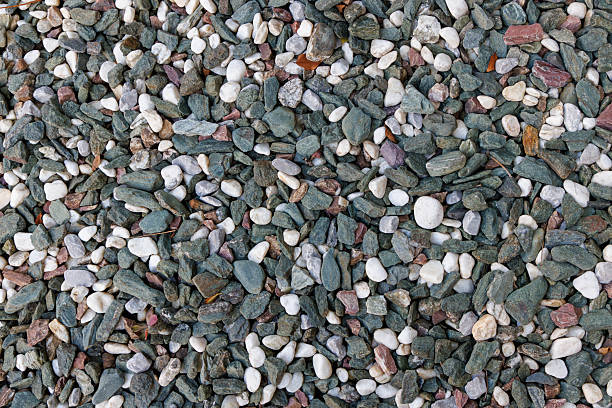 Crushed close up different stone texture background.