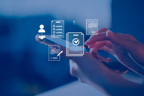 istock Businessman using smartphone to check digital checklist smart technology to verify digital identity, KYC documents, and approve online profiles, representing secure authentication in digital business 2245236862