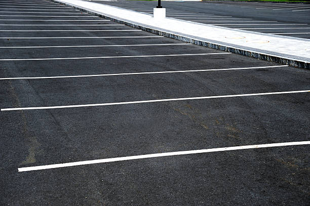 istock empty parking lots outdoor with dividing lines 2245239713