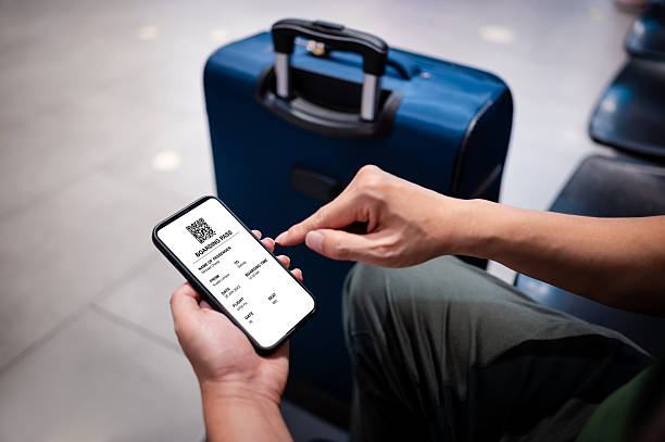 istock Close-up of a tourist checking smartphone for his flight time 2245242763