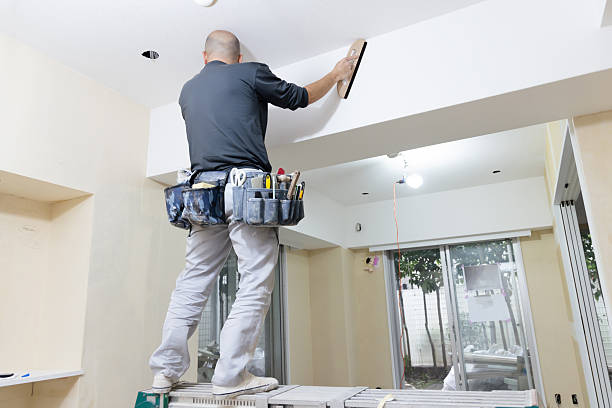 istock Asian male craftsman renovating a room 2245245301