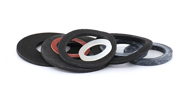 istock Collection of various rubber gaskets arranged and isolated on a plain white background. 2245251219