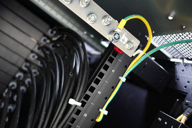 istock Close-Up of Network Cables in Rack 2245254938