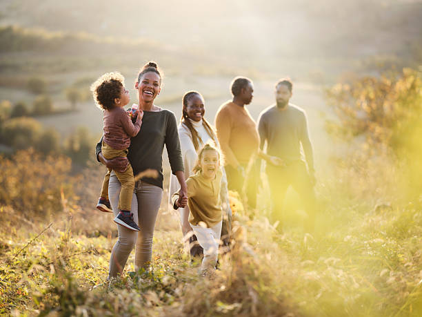 istock Happy black multi-generation family walking in autumn day. 2245257613