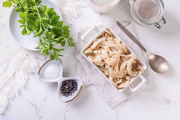 istock Fresh cooked tripes, cut into stripes with herbs for cooking 2245258051