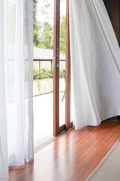 istock Airy Room with Flowing Curtains and Garden View 2245258882