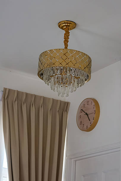 istock Elegant Interior with Chandelier, Curtains, and Wall Clock 2245259209