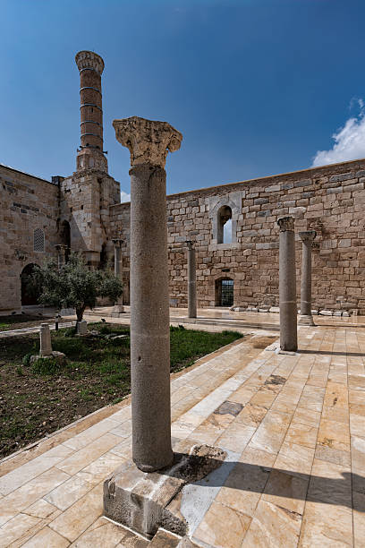istock Historic Isabey Mosque Courtyard with Ancient Columns and Minaret, Selcuk, Izmir, Turkey 2245263214