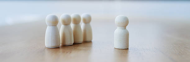 istock Leadership recruitment concept with wooden figures representing team dynamics and decision making in business and management strategy 2245264367