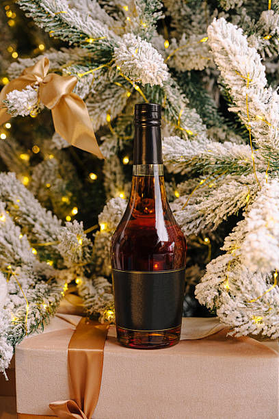 istock Cozy holiday scene with drinks and a decorated tree 2245264505