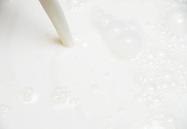 Organic White Milk Texture with bubbles and splashes