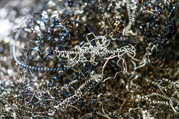 A dramatic close-up capturing the impact and fracture of a metal fence. The composition emphasizes the sharp bends, distorted lines, and raw power of the deformation, creating a visceral experience.