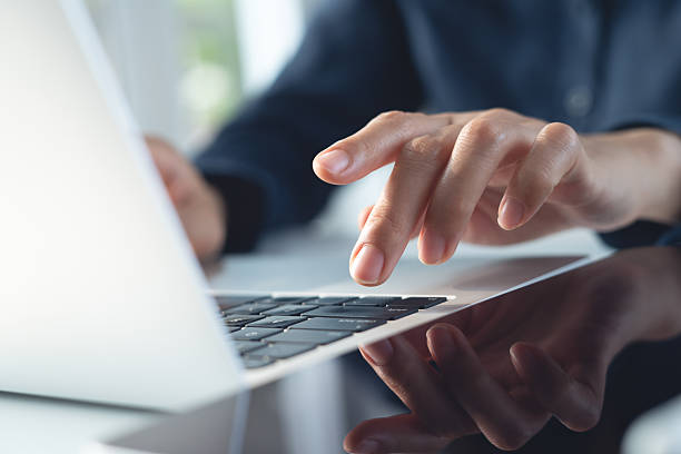 istock Close up, business woman hand typing, working on laptop computer with digital tablet on office table, surfing the internet, searching the information, business technology, remote work concept 2245270802