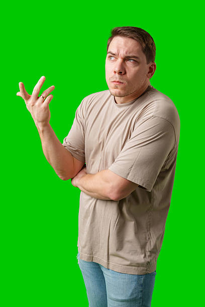 istock Thoughtful man gestures against a green background 2245271032