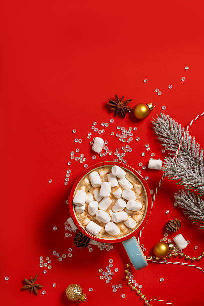 istock Festive flat lay with Christmas theme and decorations and cocoa on an isolated background 2245273389