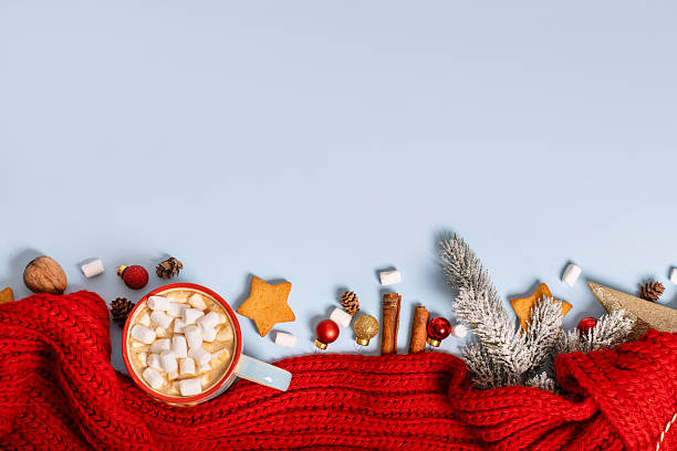 istock Festive flat lay with Christmas theme and decorations and cocoa on an isolated background 2245274062