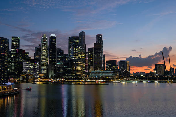 istock Singapore city skyline financial district evening night 2245276351