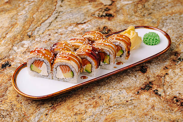 istock Delicious sushi platter served on a stylish plate in a cozy restaurant setting 2245277987