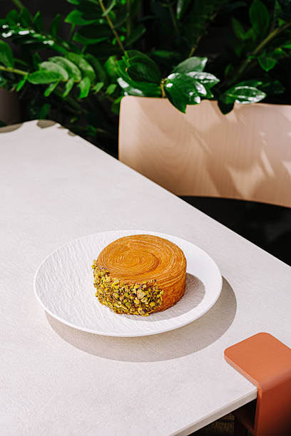 istock Delicious dessert on a stylish table surrounded by greenery in a modern setting 2245278170