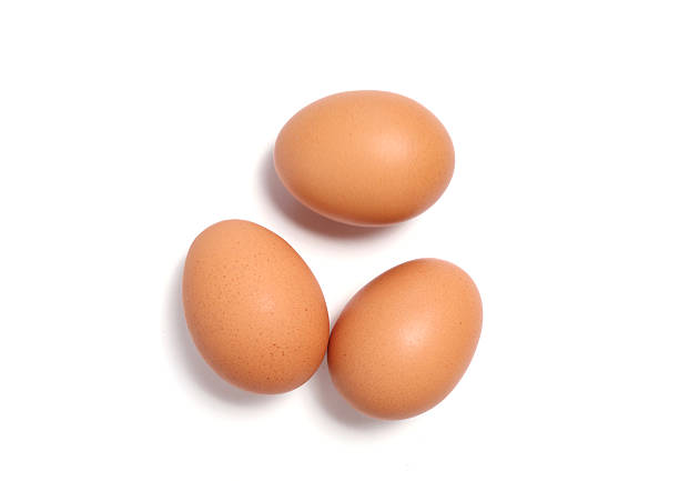 istock Three brown chicken eggs isolated on white background. Suitable for organic food, protein, and healthy lifestyle themes. Perfect for cooking, nutrition, natural farming, clean eating design concepts. 2245280131