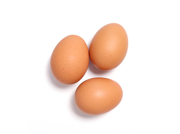 istock Three brown chicken eggs isolated on white background. Ideal for organic food, protein, healthy lifestyle, and farm-fresh product concepts. Great for cooking, nutrition, and natural ingredient 2245280179
