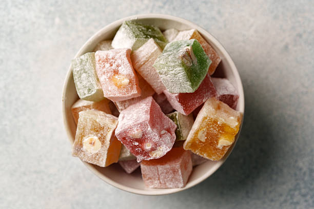 istock Colorful Turkish delight in a bowl on a light surface contrasting with the vivid candy 2245287506
