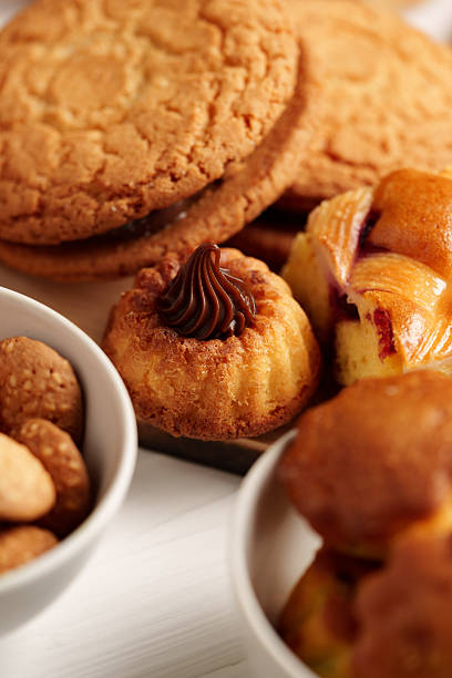 istock Freshly baked sweets and pastries arranged on a white background showcasing various textures and flavors 2245287573