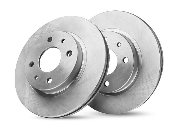 istock Two car brake discs close-up on a white. Isolated 2245289398