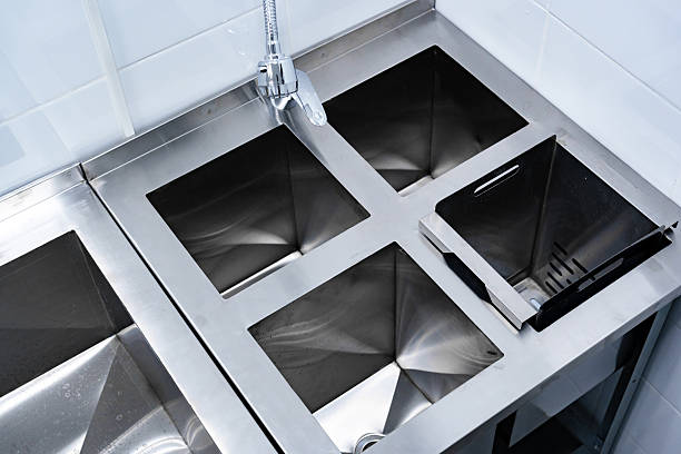 istock Modern stainless steel kitchen sink design with multiple compartments for efficient food preparation 2245290542