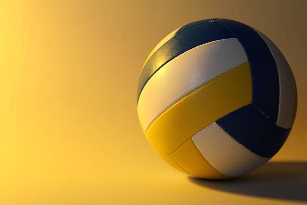 istock Colorful volleyball ball on yellow background. Space for text 2245295339