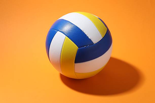 istock One colorful volleyball ball on orange background 2245295357