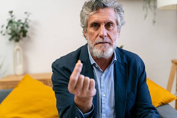 istock Senior businessman talking during online video conference call 2245296209