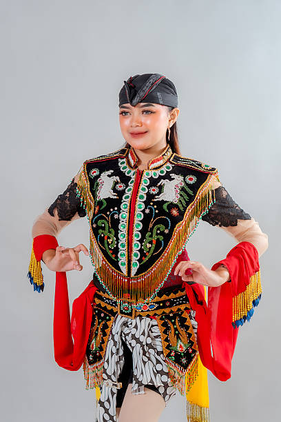 istock A female Jathilan dancer strikes a graceful pose in traditional Javanese costume, showcasing the cultural richness, elegance, and unique artistic heritage of Indonesian folklore. 2245299938
