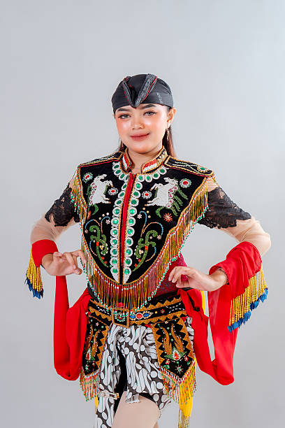 istock A female Jathilan dancer strikes a graceful pose in traditional Javanese costume, showcasing the cultural richness, elegance, and unique artistic heritage of Indonesian folklore. 2245299952