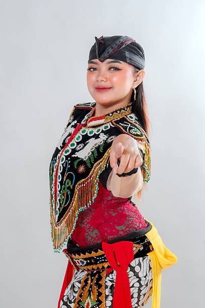 istock A confident Javanese traditional dancer in an ornate Jathilan costume points directly at the camera, representing strength, pride, and the cultural richness of Indonesian heritage. 2245300210