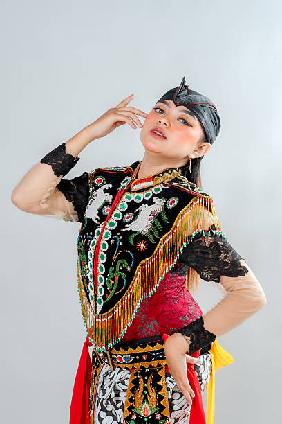 istock A beautiful Javanese dancer poses elegantly in traditional Jathilan costume, adorned with colorful embroidery, representing Indonesia's rich cultural heritage and classical performing arts. 2245300214