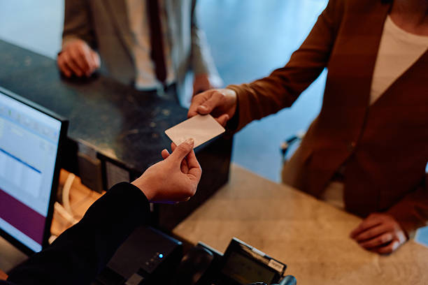 istock Guest paying for hotel room with credit card 2245303549