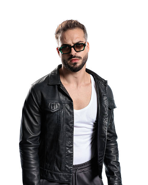istock cool young man with sunglasses in black leather jacket looking forward 2245306580