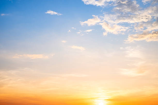 istock Beautiful , luxury soft gradient orange gold clouds and sunlight on the blue sky perfect for the background, take in evening,Twilight, Large size, high definition landscape photo 2245306844