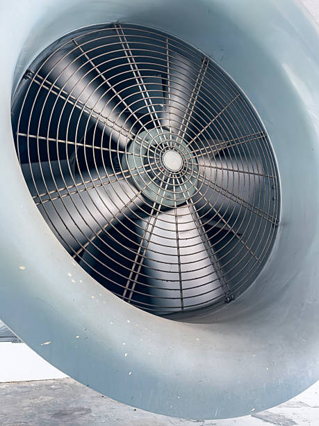 istock Large industrial fan in a factory setting 2245309099