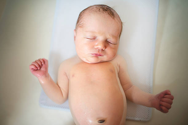 istock A friendly newborn baby-girl in bath 2245309440