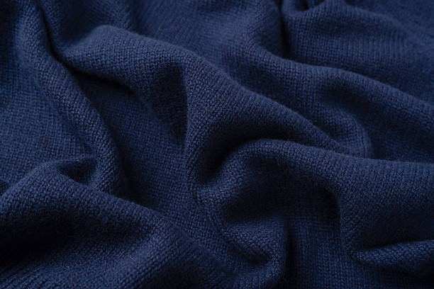 istock Navy blue merino wool sweater texture as background. Top view. 2245317375