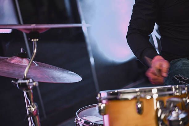 istock Drummer In Live Performance Playing The Drum Kit With Cymbals On Stage At Night 2245320057