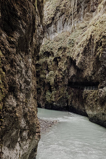 istock Aare Gorge in the Bernese Oberland with dramatic cliffs, narrow canyon and turquoise river, natural wonder in Switzerland 2245325033