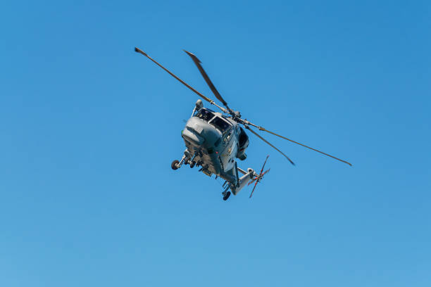 istock Military helicopter in sky 2245326774