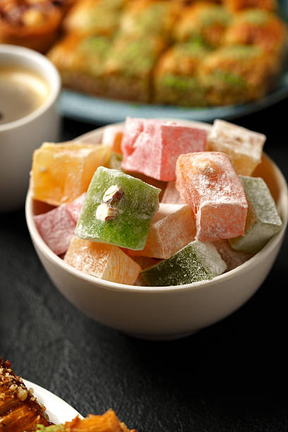 istock Colorful Turkish delight served in a bowl with sweets and coffee on a table 2245328821