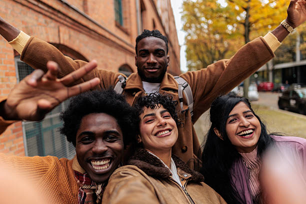 istock Friends Laughing and Taking Selfie Street 2245332776