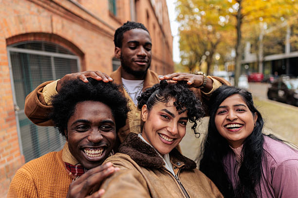 istock Friends Laughing and Taking Selfie Street 2245332816
