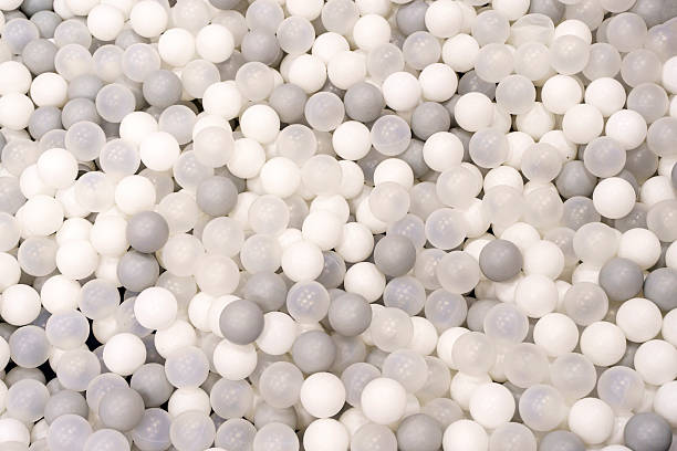 istock White and Gray Plastic Balls in Kids Ball Pit. Play and Fun Concept 2245333316