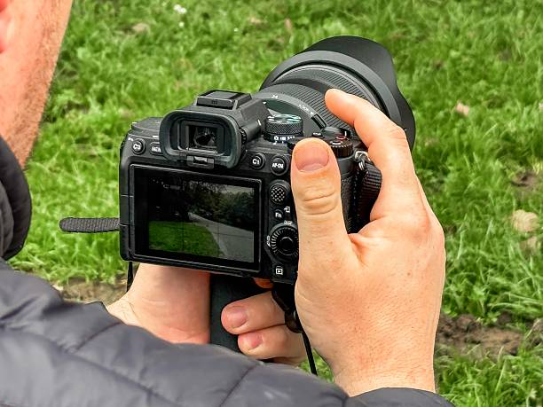 Camera, mobile phone, record the beautiful sunset city scenery